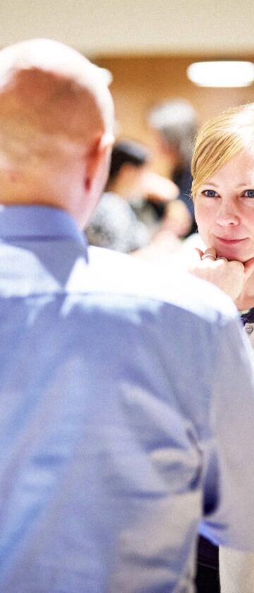 People learning from the insights of an IT consultant
