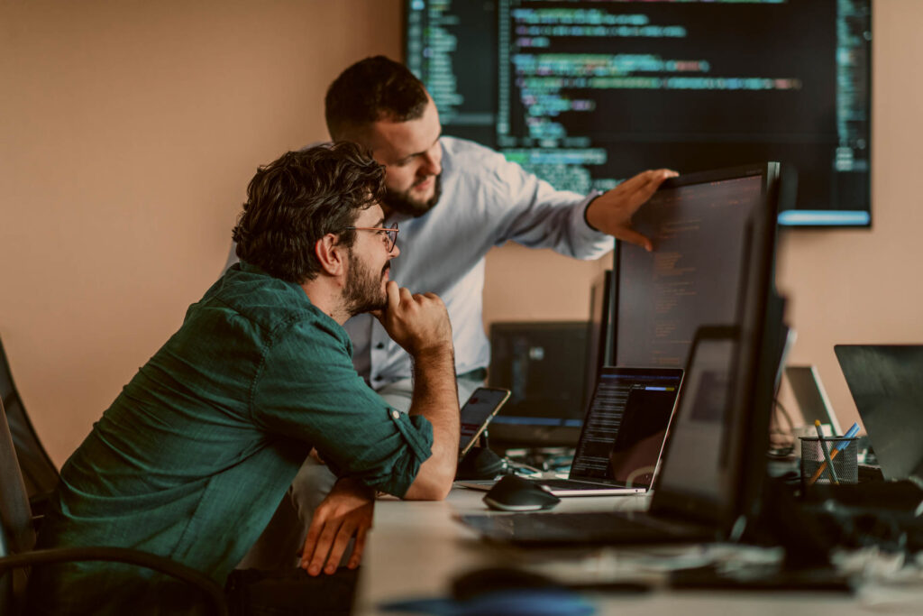 IT consultants integrating AI in software development.