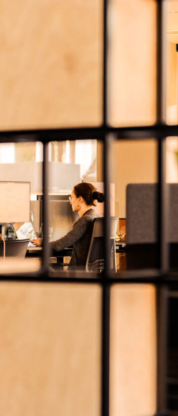 Woman working on an IT due diligence report