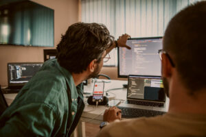 IT consultants working on cloud migration.
